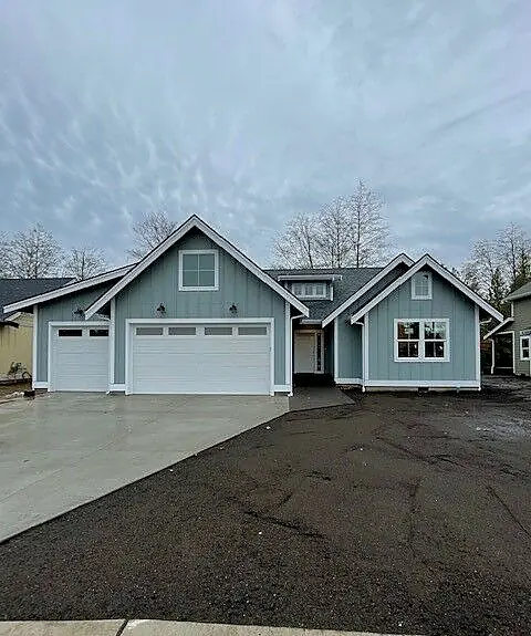 Completed blue-gray single-story home